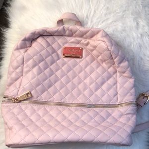Bebe light pink medium sized backpack